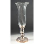 A CHRISTOFLE, FRANCE, STORM LAMP with glass top and circular plated base. 16ins high.