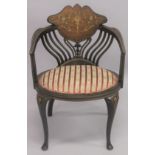 A VICTORIAN ROSEWOOD INLAID TUB ARMCHAIR with padded seats on curving legs.
