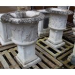 A GOOD PAIR OF CARVED ITALIAN WHITE MARBLE URNS ON PEDESTAL BASES. 100cm high.