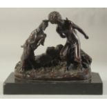 A GOOD BRONZE OF A BOY WITH A GOAT. 8 ins long, on a marble base.