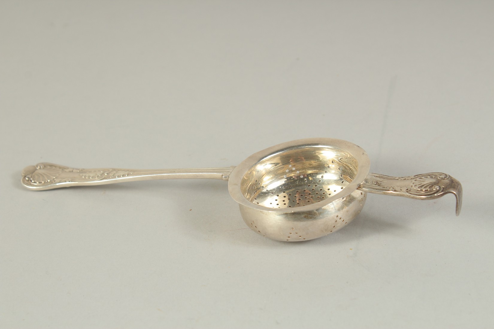 A SILVER TEA STRAINER, LONDON, 1904, together with a silver frame. Tea strainer: hallmarked. - Image 2 of 9
