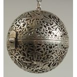 A CHINESE BALL CENSER. 2ins diameter on a chain.