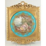 A VERY GOOD 18TH CENTURY SERVES PORCELAIN CIRCULAR PLAQUE. After " FAGUER". a young man and girl
