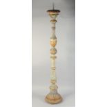 A GOOD 18TH CENTURY CARVED AND GILDED ITALIAN PRICKET CANDLESTAND. 4ft 4ins.