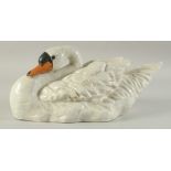 A LARGE SEVRES DESIGN WHITE PORCELAIN SWAN. 16ins long.