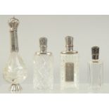 FOUR GOOD 19TH CENTURY FRENCH SILVER MOUNTED GLASS SCENT BOTTLES.