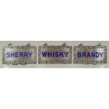 THREE SILVER AND ENAMEL WINE LABELS: SHERRY, BRANDY, WHISKY.