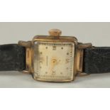 A LADIES LONGINES WRISTWATCH with leather strap