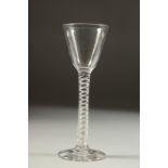 AN 18TH CENTURY ENGLISH WINE GLASS with inverted bowl and air twist stem. 6ins high.