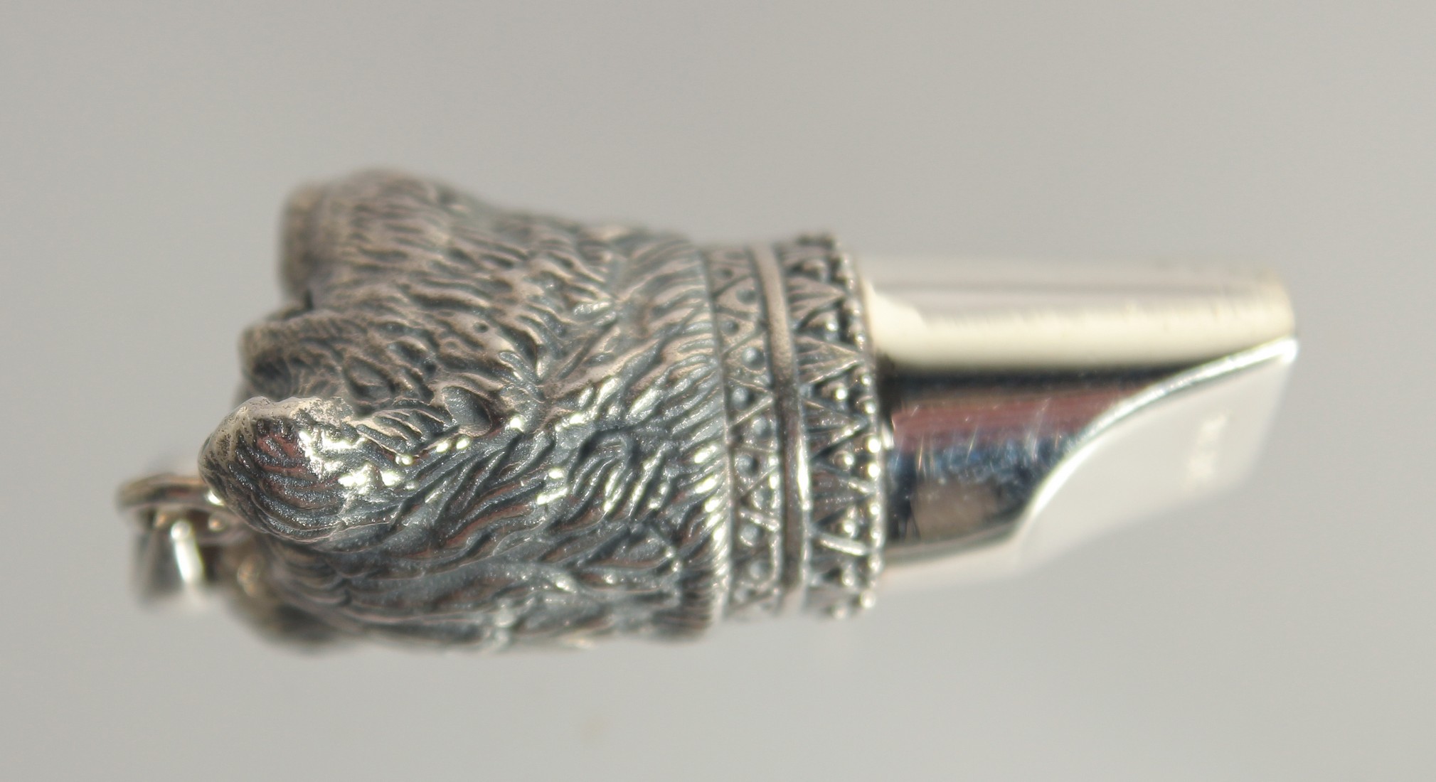 A SILVER NOVELTY BEAR WHISTLE, 1.5" long. - Image 2 of 2