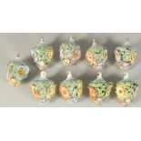 A GOOD SET OF NINE MEISSEN PORCELAIN FLOWER ENCRUSTED TREE DECORATIONS. 2.75ins long.