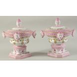 A GOOD PAIR OF PORCELAIN POTPOURRI VASES AND COVERS, with masks and garlands of flowers. 805ins