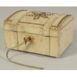 A RARE HERMES SUEDE DOMED TOP JEWELLERY BOX with brass handles, escutcheon, and studs, the silk