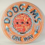 A PAINTED ROUND FAIRGROUND SIGN "DODGEMS" 30ins diameter.