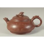 A CHINESE YIXING TEA POT. 17.5 cm (spout to handle).