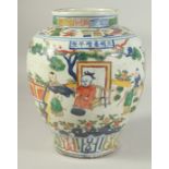 A CHINESE PORCELAIN WUCAI JAR painted with boys in a garden. 27ins high.
