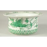 A CHINESE FAMILLE VERTE PORCELAIN BASIN decorated with dragons and stylised clouds. 27.5 cm