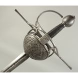 A NORTH EUROPEAN PAPPENHEIM RAPIER, slender 43in diamond section blade with single fuller stamped '