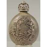 A CHINESE WHITE METAL SNUFF BOTTLE AND COVER. 3ins.