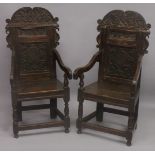 A GOOD PAIR OF MOSTLY 17TH - EARLY 18TH CENTURY OAK WAINSCOT CHAIRS with carved backs, bog oak inlay