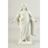 A COPENHAGEN WHITE PARIAN WARE FIGURE OF JESUS CHRIST on a square base. Marl in blue. 14ins high.