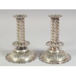 A PAIR OF 18TH CENTURY STYLE SWEDISH PLATED CANDLESTICKS. 6ins high.