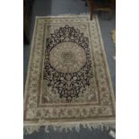 A PERSIAN PART SILK RUG, cream and blue ground with stylised floral decoration 155cm x 93cm.