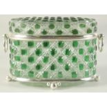 A GOOD CUT GLASS OVAL CASKET with ring handles. 14ins high.