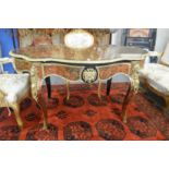 A GOOD BOULLE AND ORMOLU MOUNTED SINGLE DRAWER CENTRE TABLE of serpentine outline on cabriole