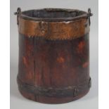 A GOOD 19TH CENTURY WOODEN COPPER MOUNTED PAIL with iron handle. 8ins high.