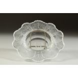A LALIQUE CIRCULAR DISH, the sides with flowers. Etched Lalique, France, bears Lalique label. 5.5ins