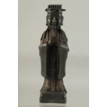 A CHINESE BRONZE FIGURE OF A DEITY. 12ins high.