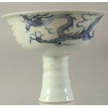 A CHINESE PORCELAIN BLUE AND WHITE STEM CUP. 4.5ins diameter.