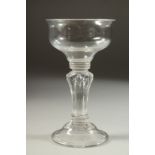 A LARGE 18TH CENTURY ENGLISH GLASS with circular bowl. 3.56ins diameter and moulded stem. 6.25ins