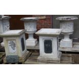 A GOOD PAIR OF CARVED ITALIAN WHITE MARBLE CAMPAGNA URNS ON PEDESTAL BASES, the urns 3ft 3ins