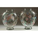 A GOOD PAIR OF ART DECO GLASS VASES with enamel decoration. 7ins high.