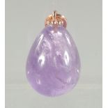 A SMALL RUSSIAN GOLD TOP AMETHYST PENDANT. 2cm long.