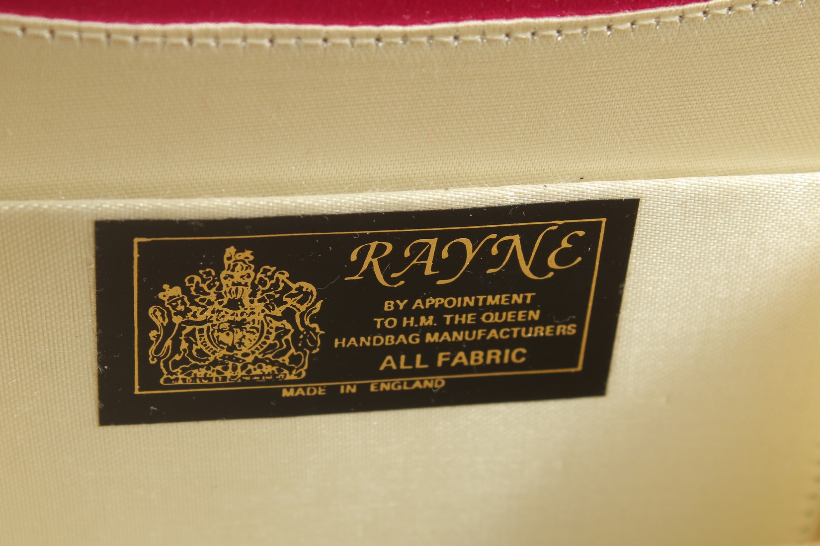 A RAYNE, BY APPOINTMENT TO HER MAJESTY THE QUEEN, PINK FABRIC EVENING BAG, 6.5ins long. - Image 3 of 4