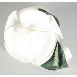 A CHANEL SILK WHITE FLOWER BROOCH. Signed.