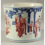 A CHINESE PORCELAIN BLUE AND RED BRUSH POT painted with figures. 6ins high.