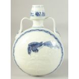 A CHINESE BLUE AND WHITE TWIN HANDLE MOON FLASK, decorated to each side with a bird. 29.5ins high.