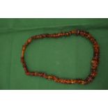A good graduated amber bead necklace.