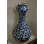 A large Chinese blue and white garlic neck vase.