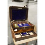 A good Victorian coromandel dressing case with fitted fitted interior complete with leather outer