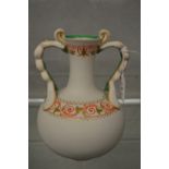 A classical revival painted and gilt decorated parian china vase.