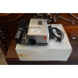 A Leica Pradobit P600 slide projector with original box etc.