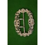 A Victorian silver nurses buckle.