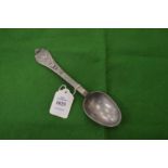 A pewter spoon.