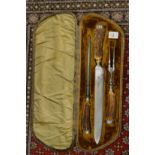 A good cased three piece carving set with antler handles.