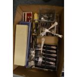 A large quantity of plated flatware, some boxed.